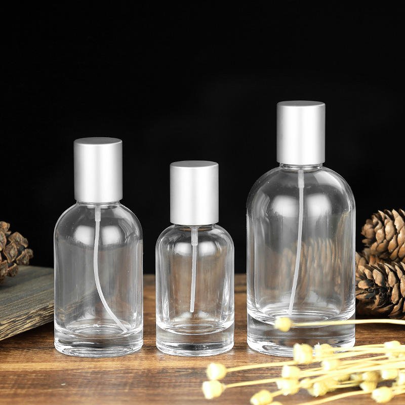 Empty Custom Empty Clear Amber Round Shape Fragrance Glass Perfume Bottle 30ml 50ml 100ml Perfume Spray Glass Bottles with Cap
