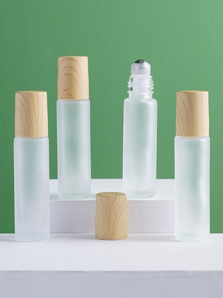 10ml 5ml perfume essential oil frosted amber clear roller on bottles bamboo roll on glass bottle with metal ball lid for oils