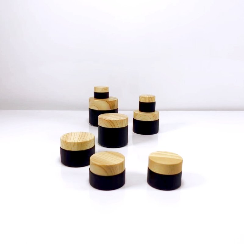 Wholesale black bamboo and wood cover glass bottle skin care cream cosmetics packaging can luxury empty face cream bottle 60g