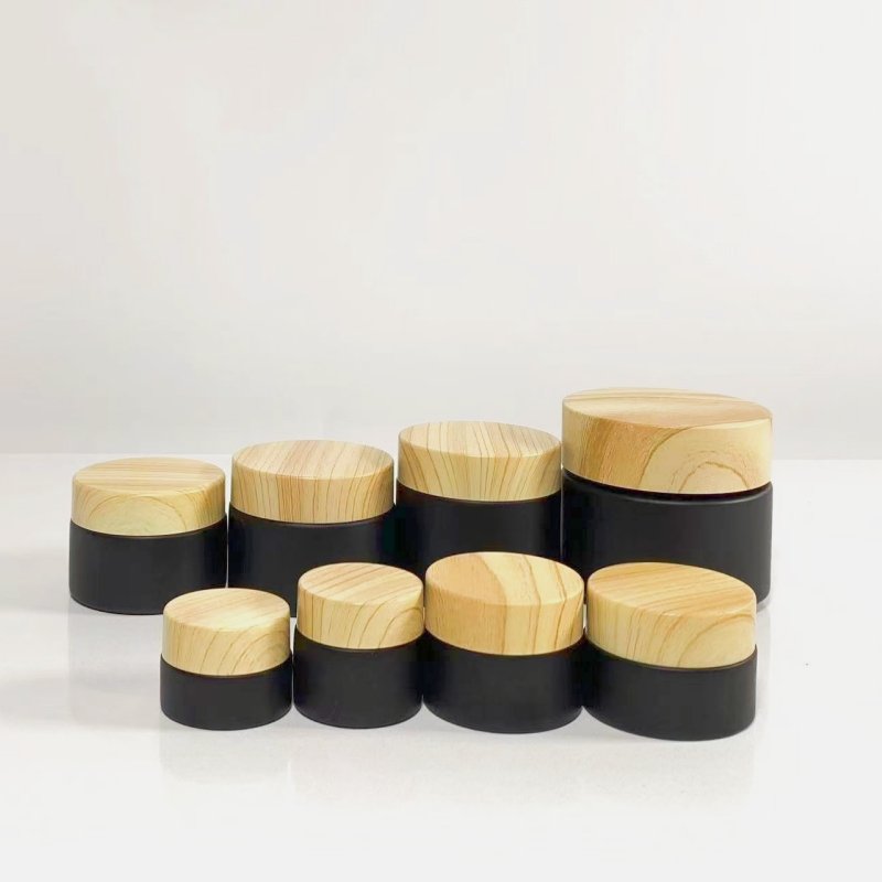 Wholesale black bamboo and wood cover glass bottle skin care cream cosmetics packaging can luxury empty face cream bottle 60g