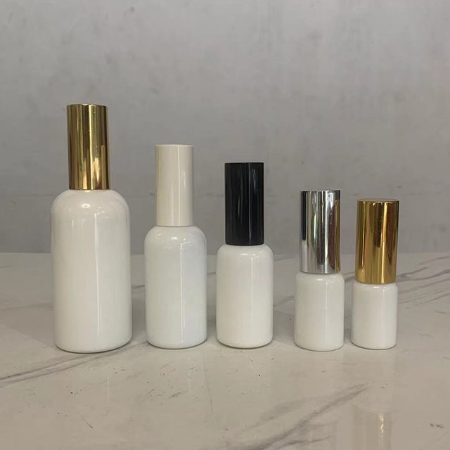 Hengjian 10ml 20ml 30ml 50ml 100ml White Porcelain Cosmetic Lotion Glass Skin Care Cream Bottle With Black Gold Silver Pump Cap