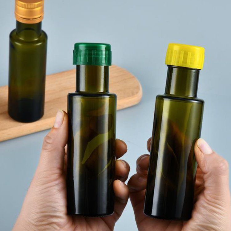 wholesale 100ml dorica glass bottle 3.3 oz green amber glass olive oil bottle with pourer lid