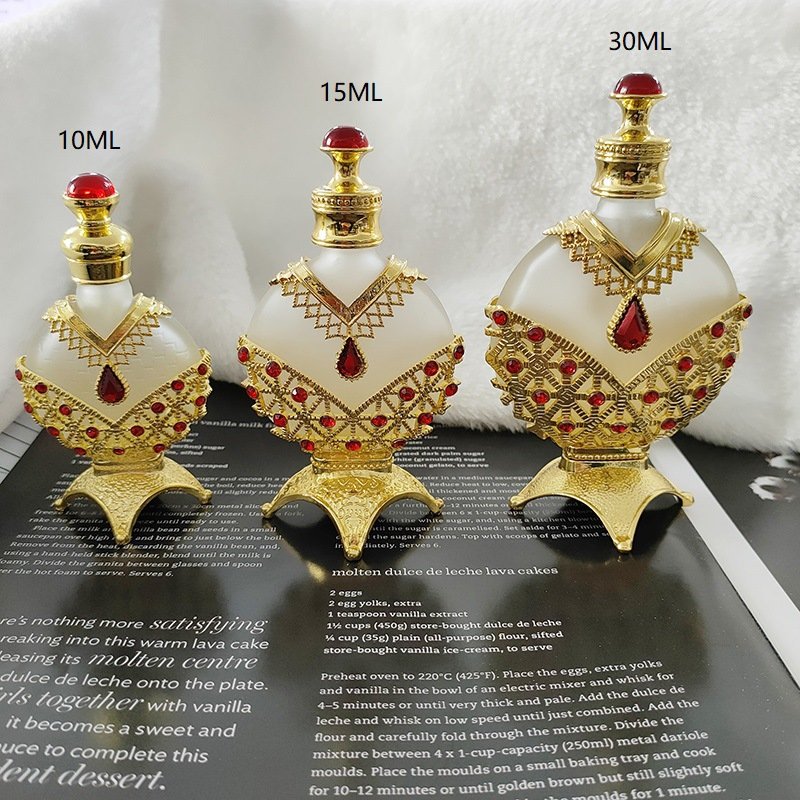 Arabic gold metal custom engraving 10ml 15ml 30ml fancy attar glass perfume essential oil bottles with gold cap