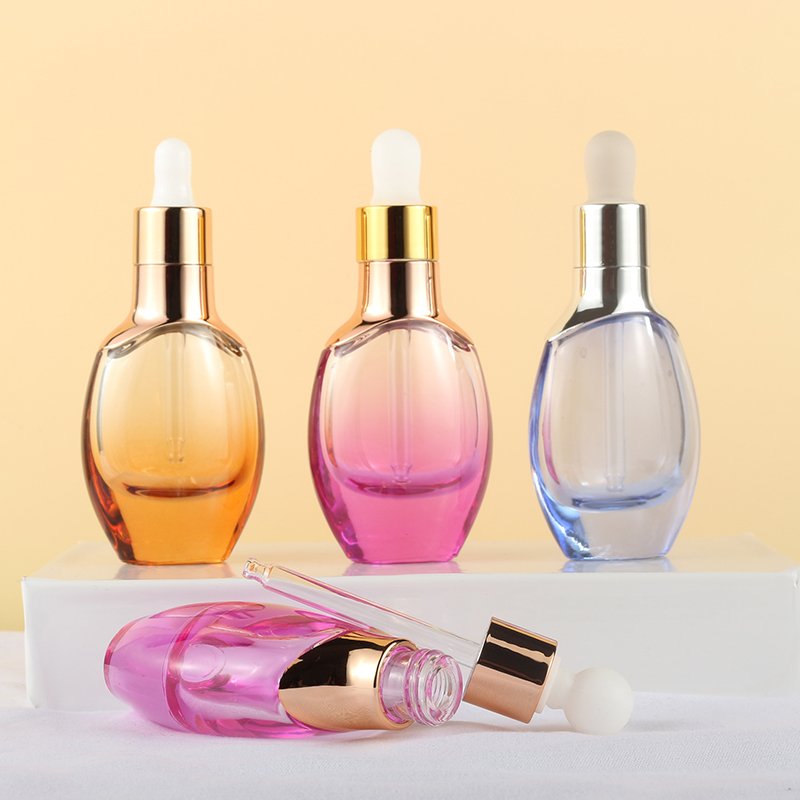 Fashion design skin care product serum glass bottle 1oz transparent flat oval essential oil dropper bottles 30ml