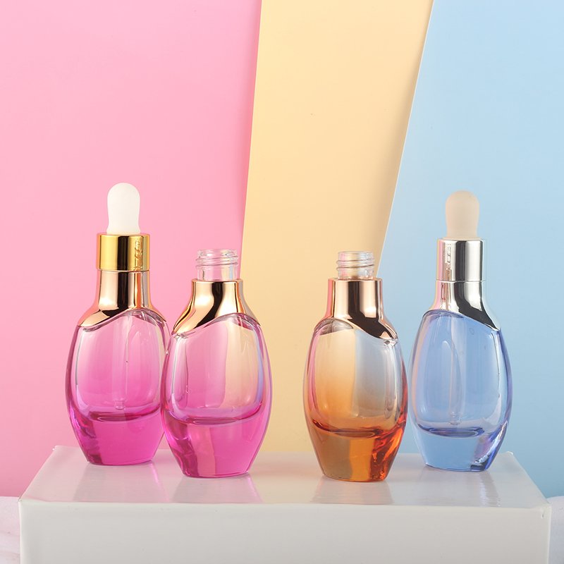 Fashion design skin care product serum glass bottle 1oz transparent flat oval essential oil dropper bottles 30ml