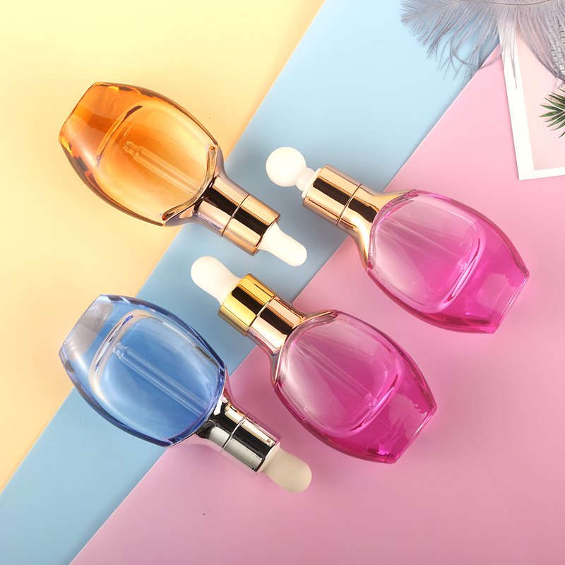 Fashion design skin care product serum glass bottle 1oz transparent flat oval essential oil dropper bottles 30ml