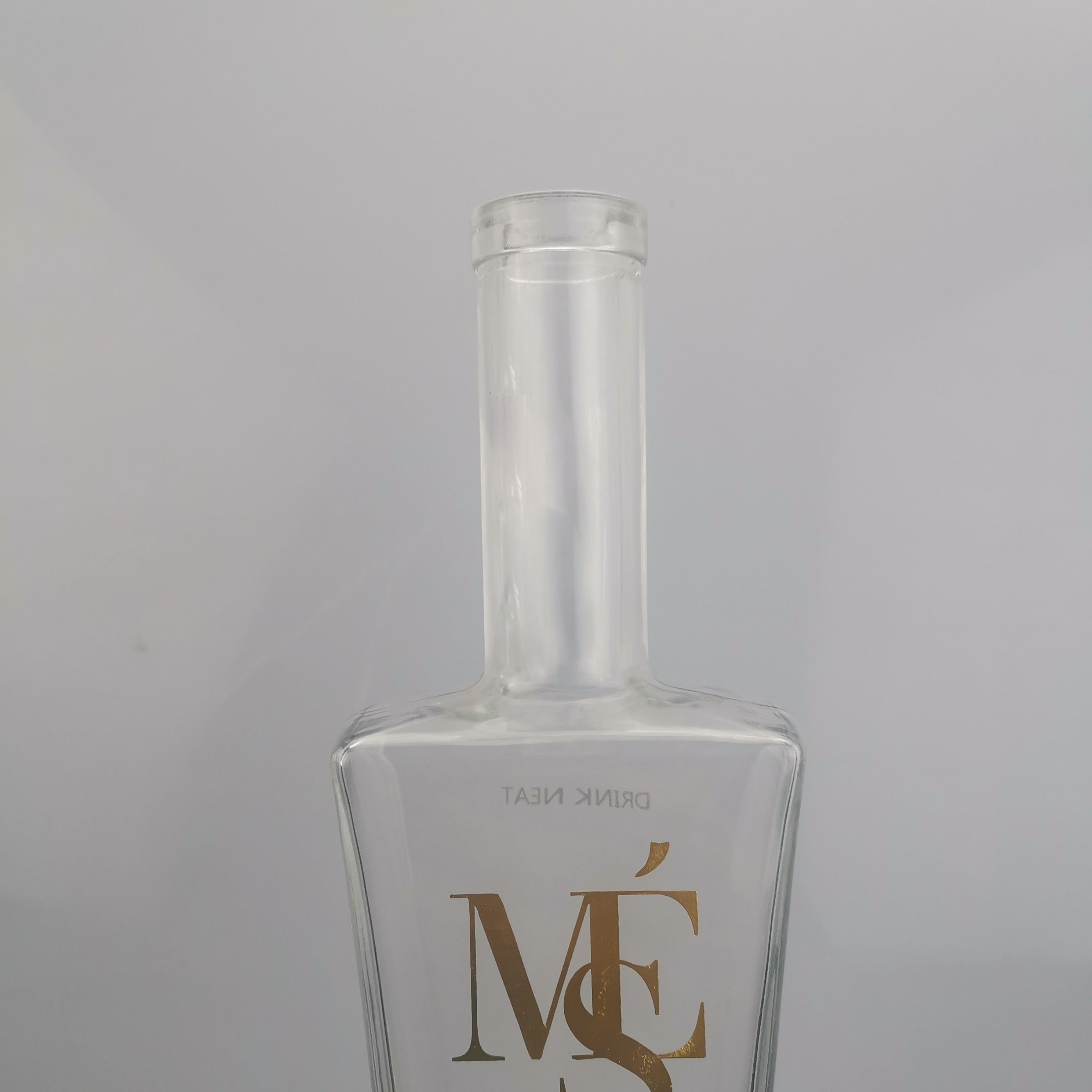 Wholesale High Quality 1000ml Glass Bottles with Crown Cap Transparent Design Custom Logo round Shape for Water and Wine Use