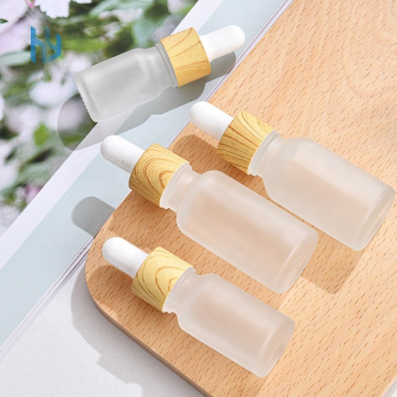 Wholesale price large capacity glass essential oil dropper bottles striped shapes glass bottles containers essential oil bottle