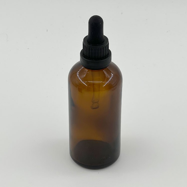 Wholesale custom 10ml 15ml 30ml 100ml amber round serum bottle glass essential oil bottle with dropper