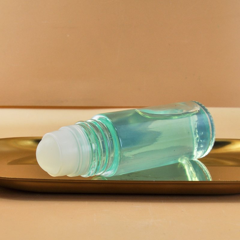 High quality 30ml 50ml round shape Roll On glass bottle essential oil ball bottle Empty Roller Bottle With Cap