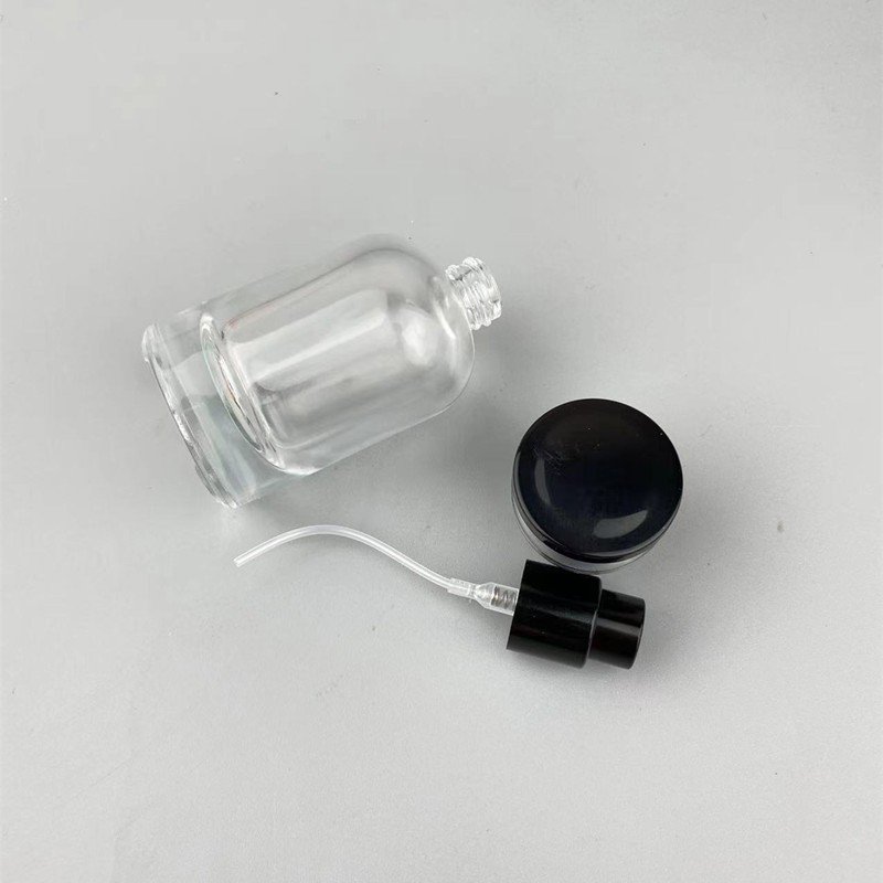 Hot sale Black Cap Glass Empty Perfume Bottle Cylinder Customized Logo 30ml Clear Round Refillable Glass Perfume Bottle