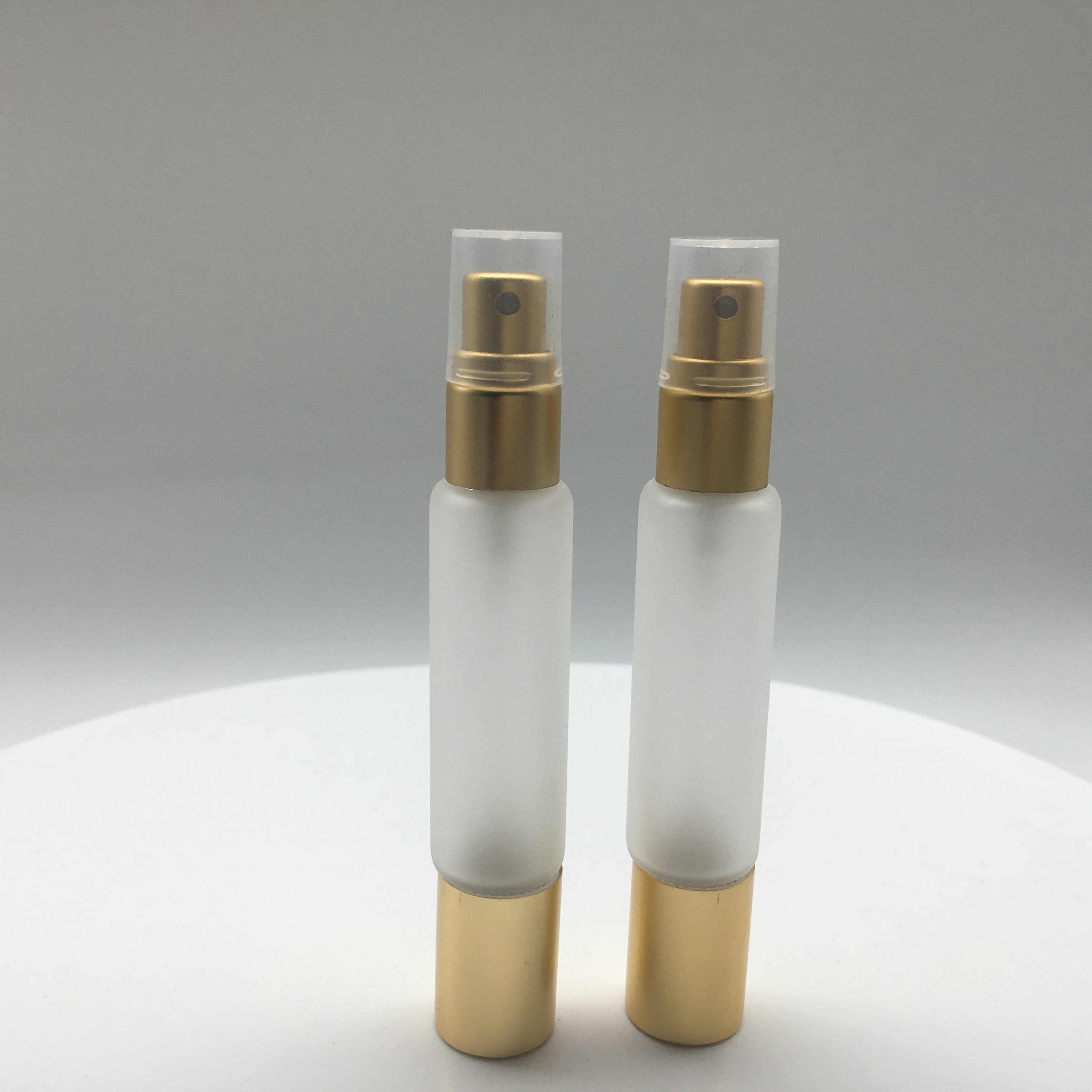 wholesale 10ml clear frost dual end glass cosmetic essential oil perfume aroma spray bottle with sprayer and roller top