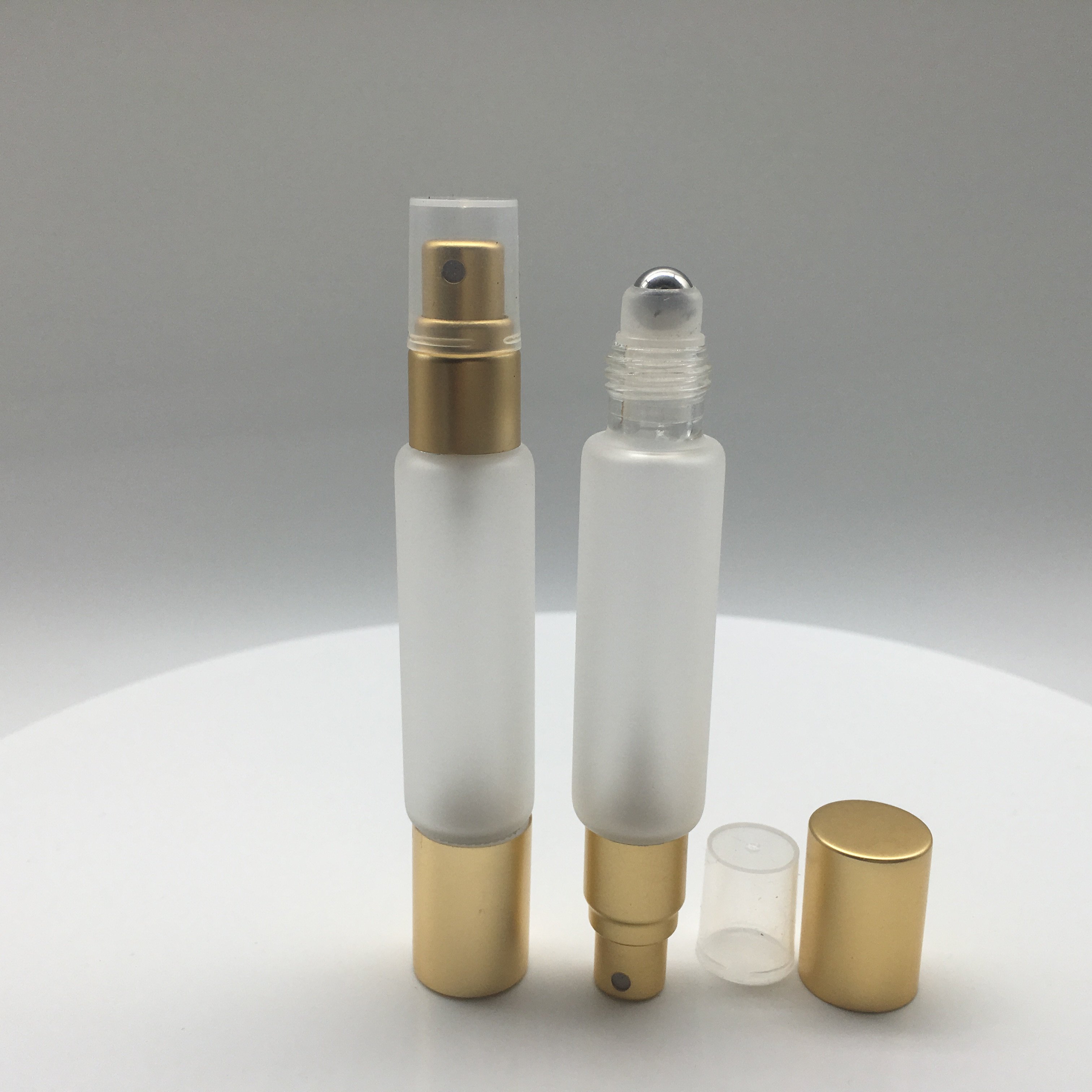 wholesale 10ml clear frost dual end glass cosmetic essential oil perfume aroma spray bottle with sprayer and roller top