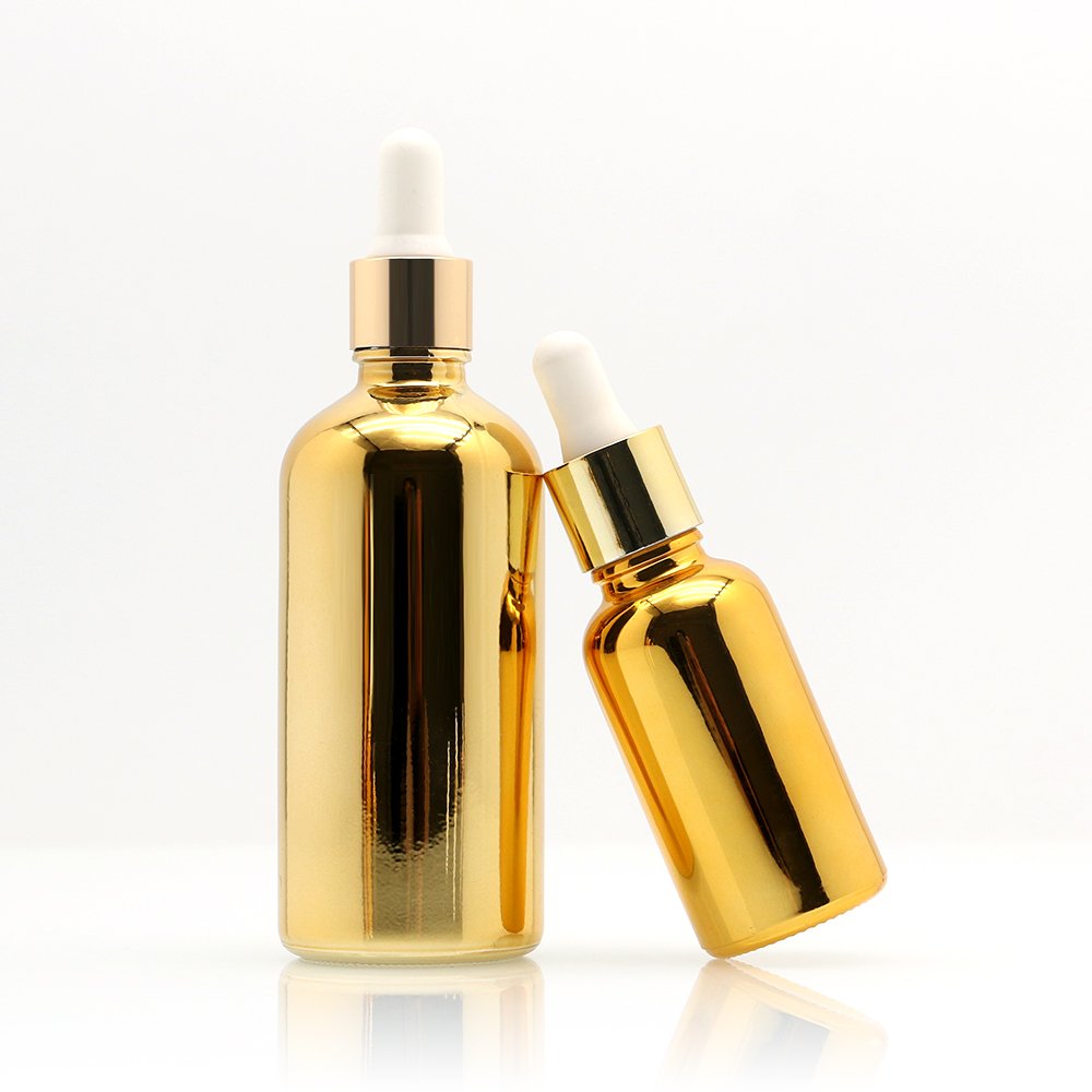 Low Moq Customized Electroplated Gold Silver Luxury Round 1oz 2oz 4oz Flat Shoulder Perfume Essential Oil Cologne Glass Bottles