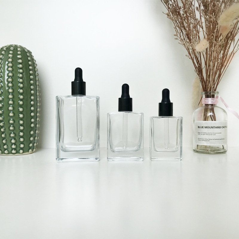 Cosmetic Package Square Clear Glass Pipette Flat Serum Bottles 30ml 50ml 100ml Essential Oil Rectangle Glass Dropper Bottle