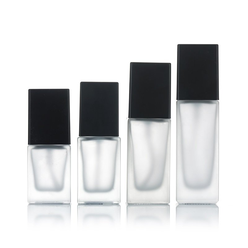 Wholesale 15ml 20ml 30ml 40ml essence pump press type square foundation liquid lotion spray glass bottles for sale