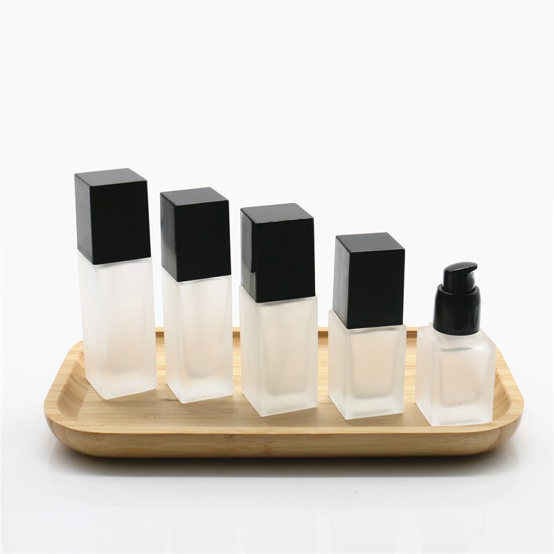 Wholesale 15ml 20ml 30ml 40ml essence pump press type square foundation liquid lotion spray glass bottles for sale