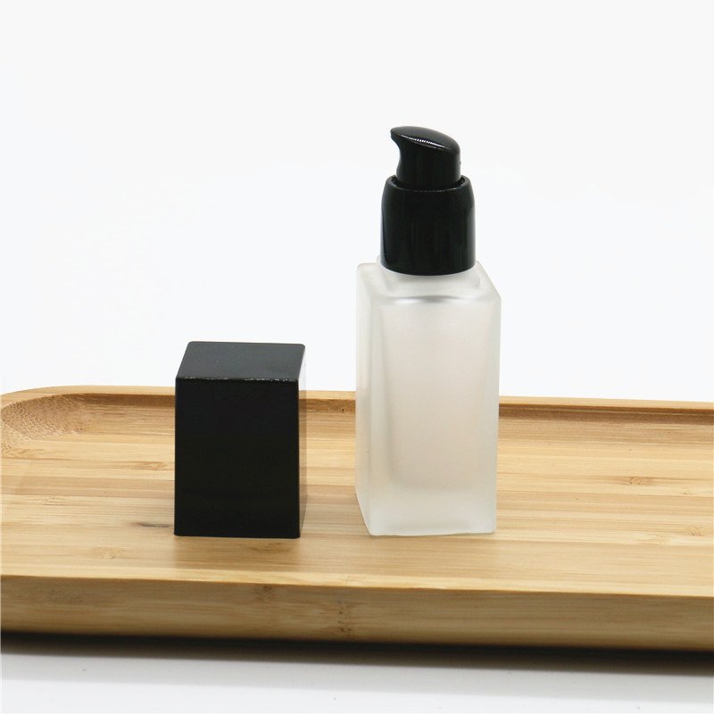 Wholesale 15ml 20ml 30ml 40ml essence pump press type square foundation liquid lotion spray glass bottles for sale