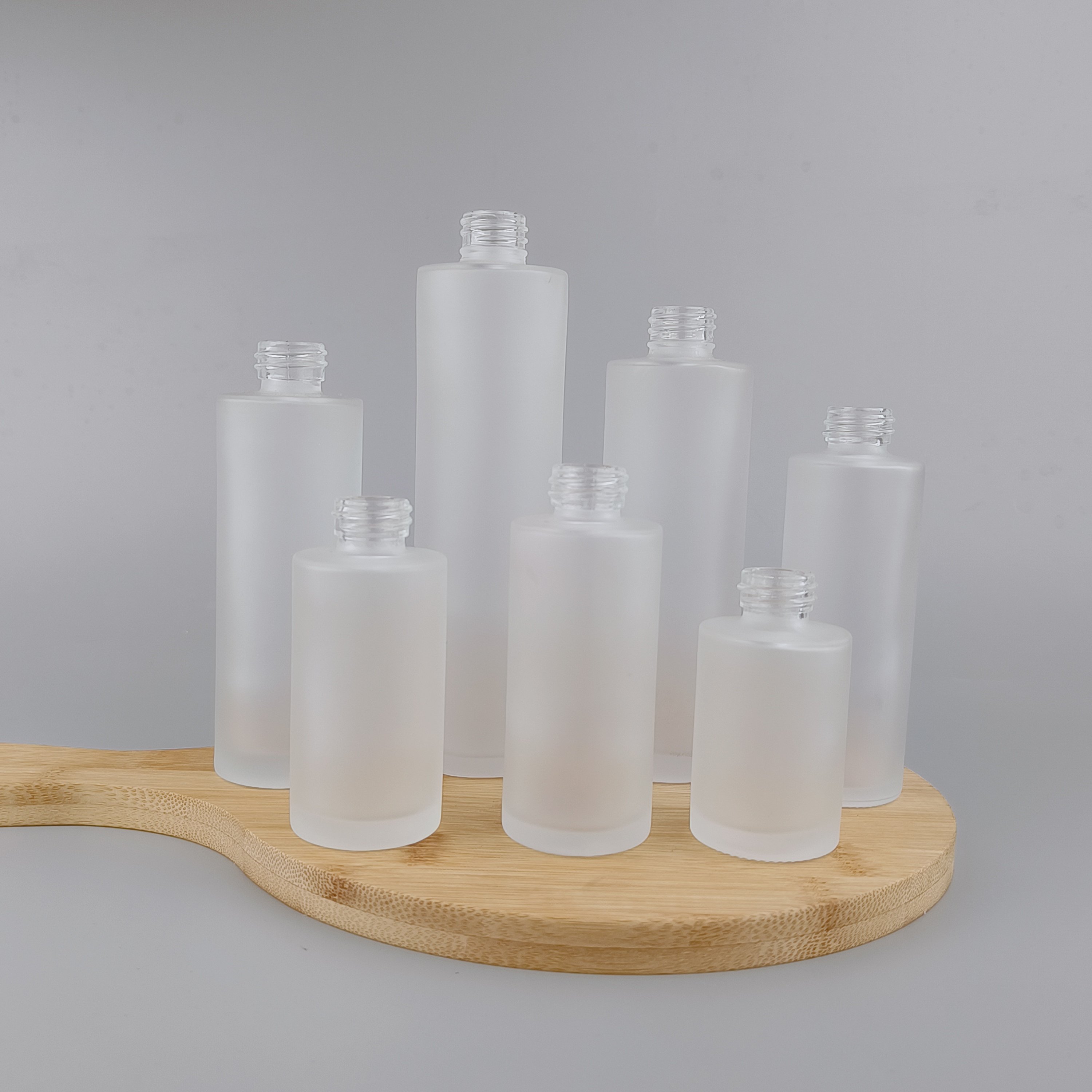 Flat shoulder glass bottle 30 ml 50 ml 60 ml frosted glass bottle serum dropper cosmetic dropper bottle with wooden dropper cap