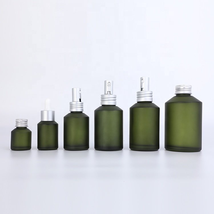 unique design slanted shoulder recyclable olive green cosmetic glass bottles and jars with mental aluminum lid for skin care