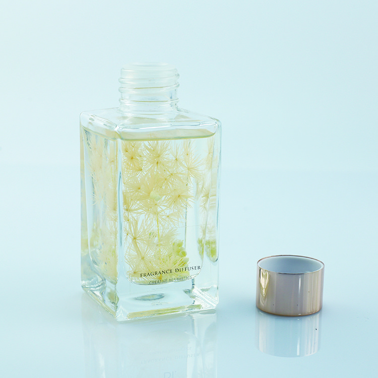 Hot sale OEM Luxury home fragrance decor reed diffuser glass bottle natural soaking flower diffuser reed oil base refill 100ml