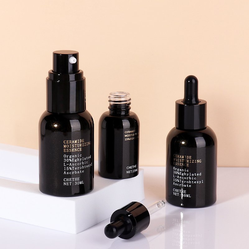 15ml 30ml Wholesale Cylinder Thick Bottom Black Cosmetic Glass Bottle With Plastic Dropper Lotion Pump For Essence Oil Package