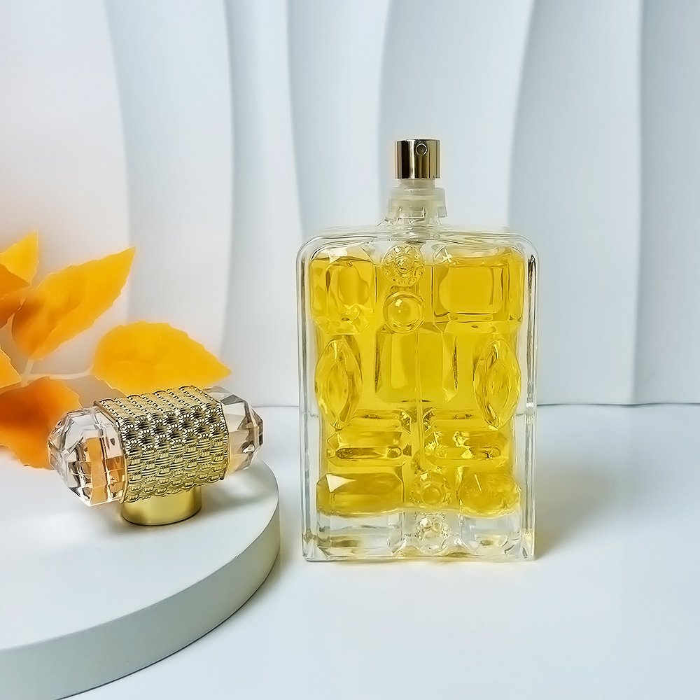 Low MOQ Luxury Perfume bottle 100Ml Recyclable Empty Square Clear Luxury Fine Mist Spray Glass Perfume Bottle with Luxury Cap