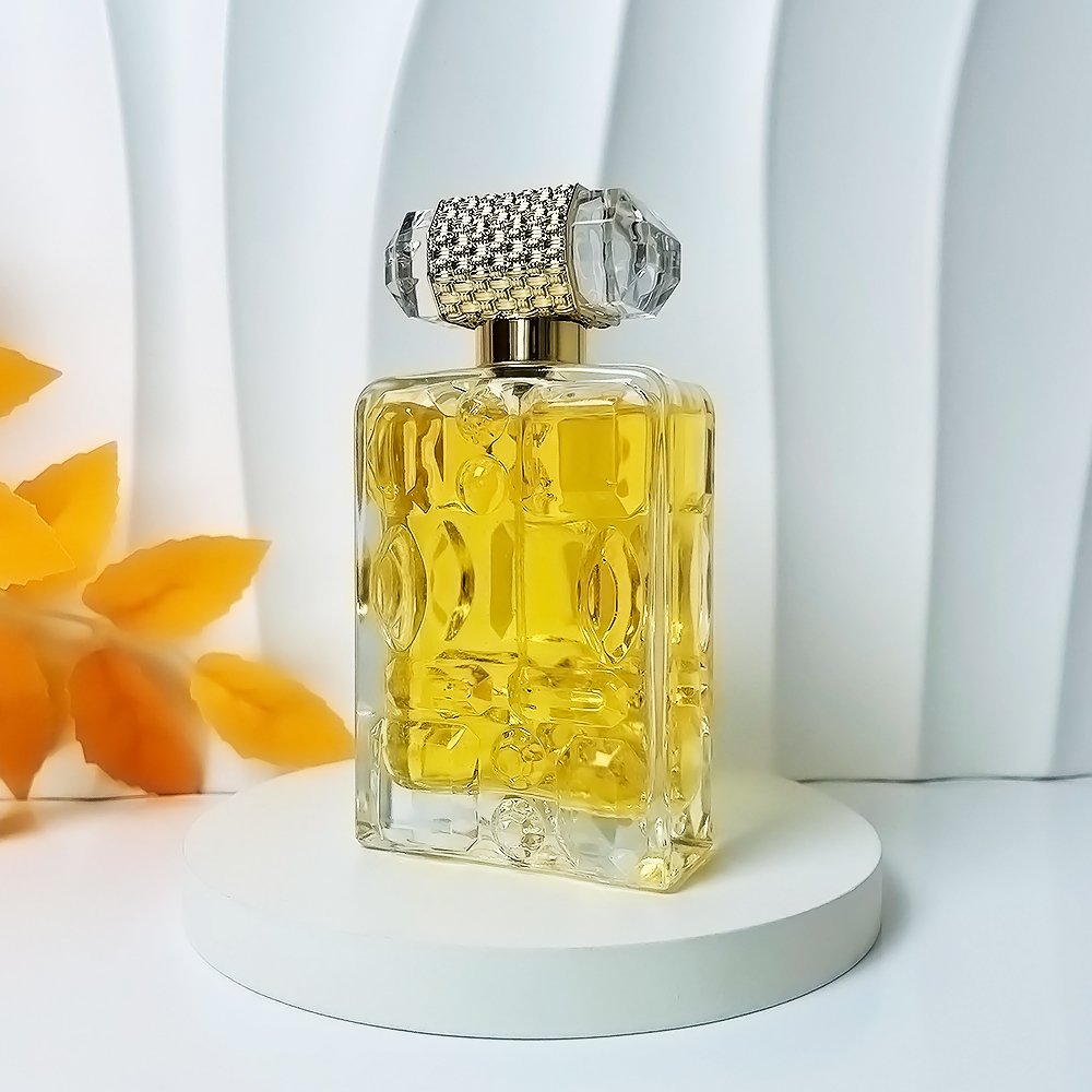 Low MOQ Luxury Perfume bottle 100Ml Recyclable Empty Square Clear Luxury Fine Mist Spray Glass Perfume Bottle with Luxury Cap