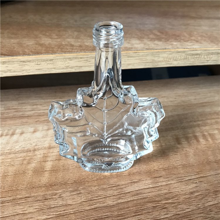 High Quality Maple Leaf Shaped 50ml 100ml 250ml Clear Syrup Glass Bottle With Gold Lid Glass Beverage Drinks Bottle With Cap