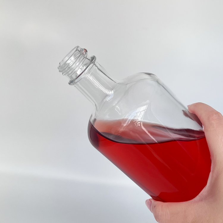 Unique design bar container luxury liquor decanter round 750ml glass bottle for vodka brandy whiskey