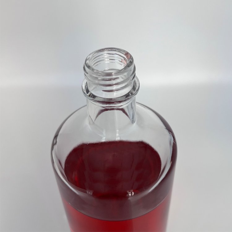 Unique design bar container luxury liquor decanter round 750ml glass bottle for vodka brandy whiskey