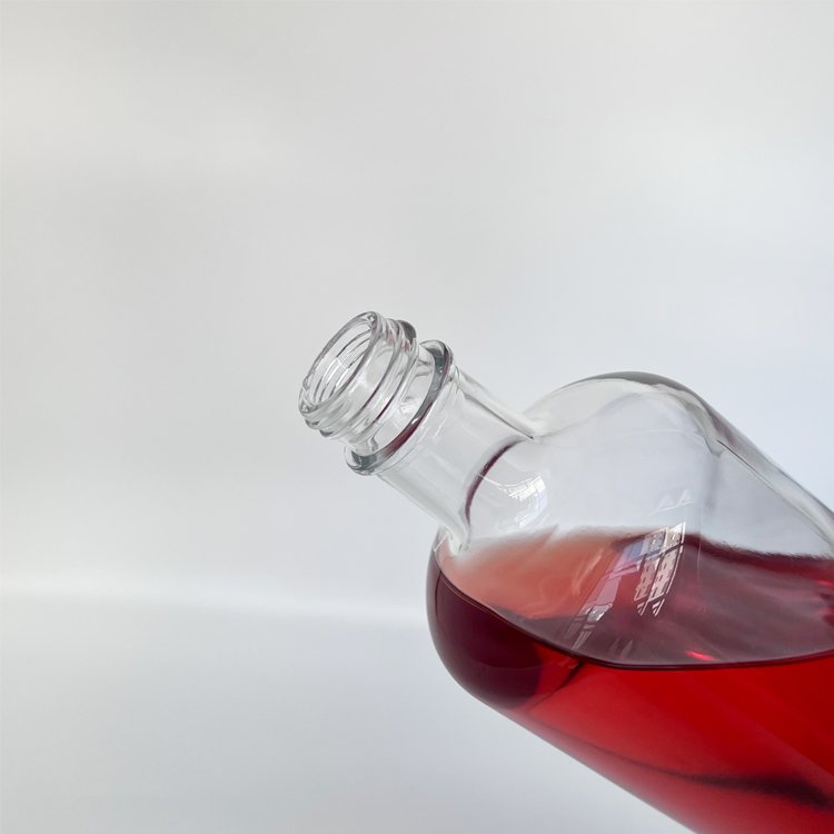 Unique design bar container luxury liquor decanter round 750ml glass bottle for vodka brandy whiskey