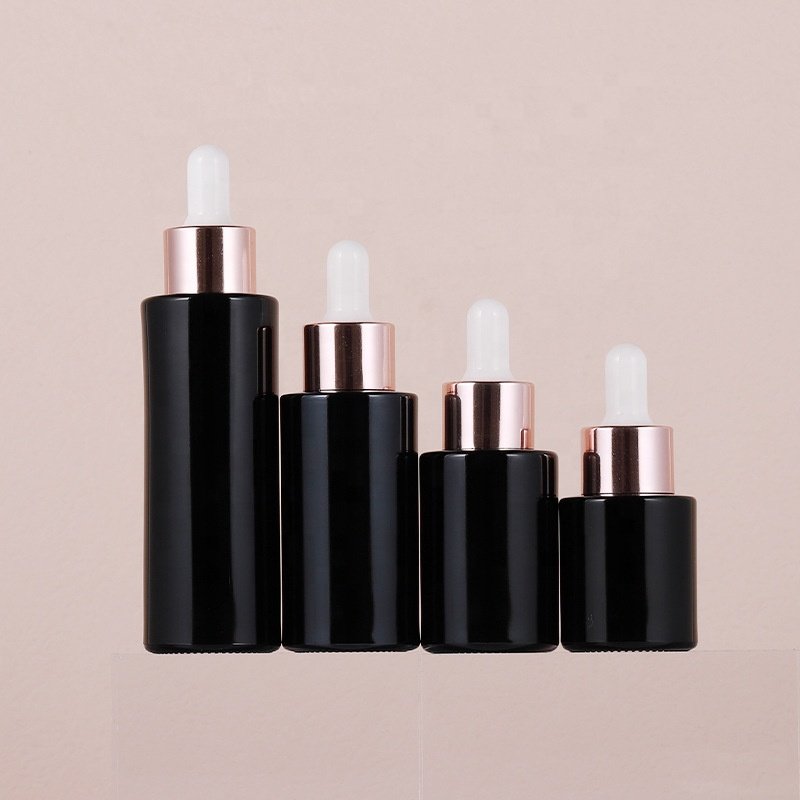Flat shoulder black glass bottle 20 ml 30 ml 40 ml 60 ml cosmetic bottle with rose gold dropper pipette for essential oil