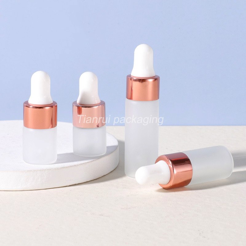 Hot Sale Frosted Clear Cosmetic Glass Vial 1ml 2ml 3ml 5ml Pink Mini Serum Essential Oil Bottle with Dropper