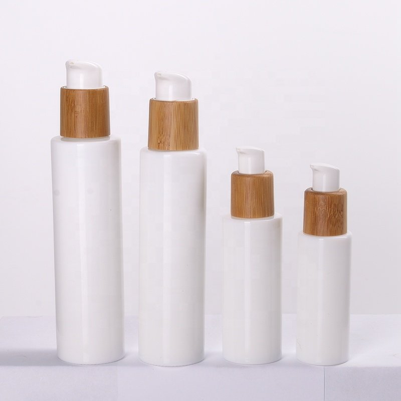flat shoulder glass bottles 30ml 50ml 100ml 120ml opal glass cosmetic bottle with pump and 50g glass jar with bamboo lid