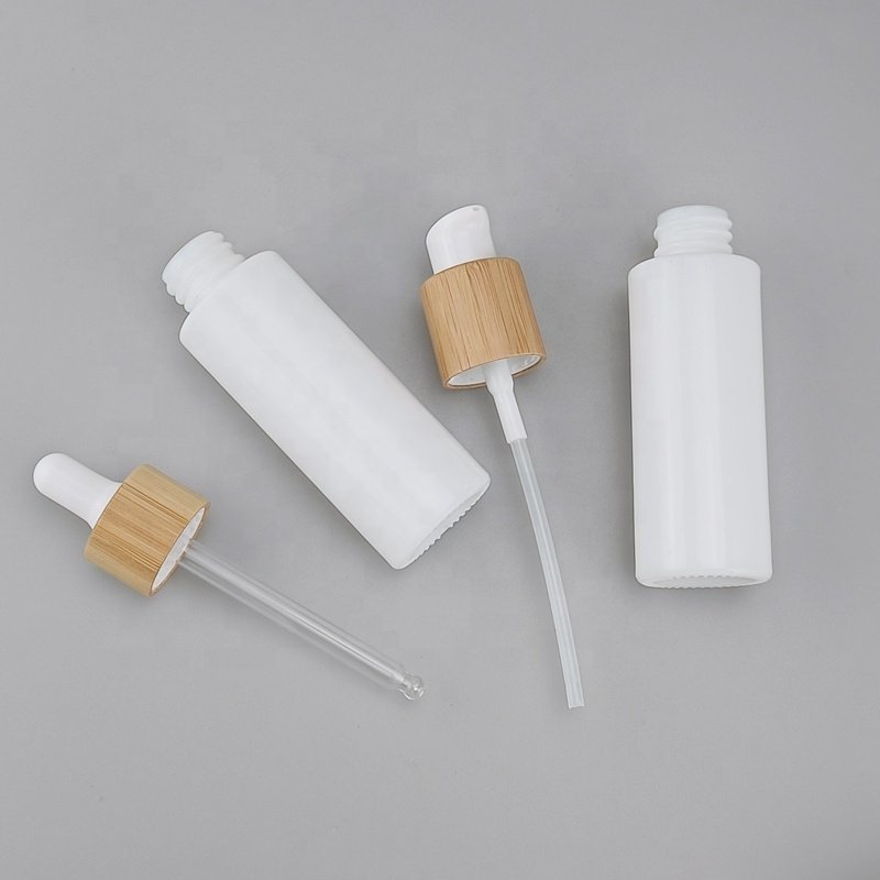 flat shoulder glass bottles 30ml 50ml 100ml 120ml opal glass cosmetic bottle with pump and 50g glass jar with bamboo lid