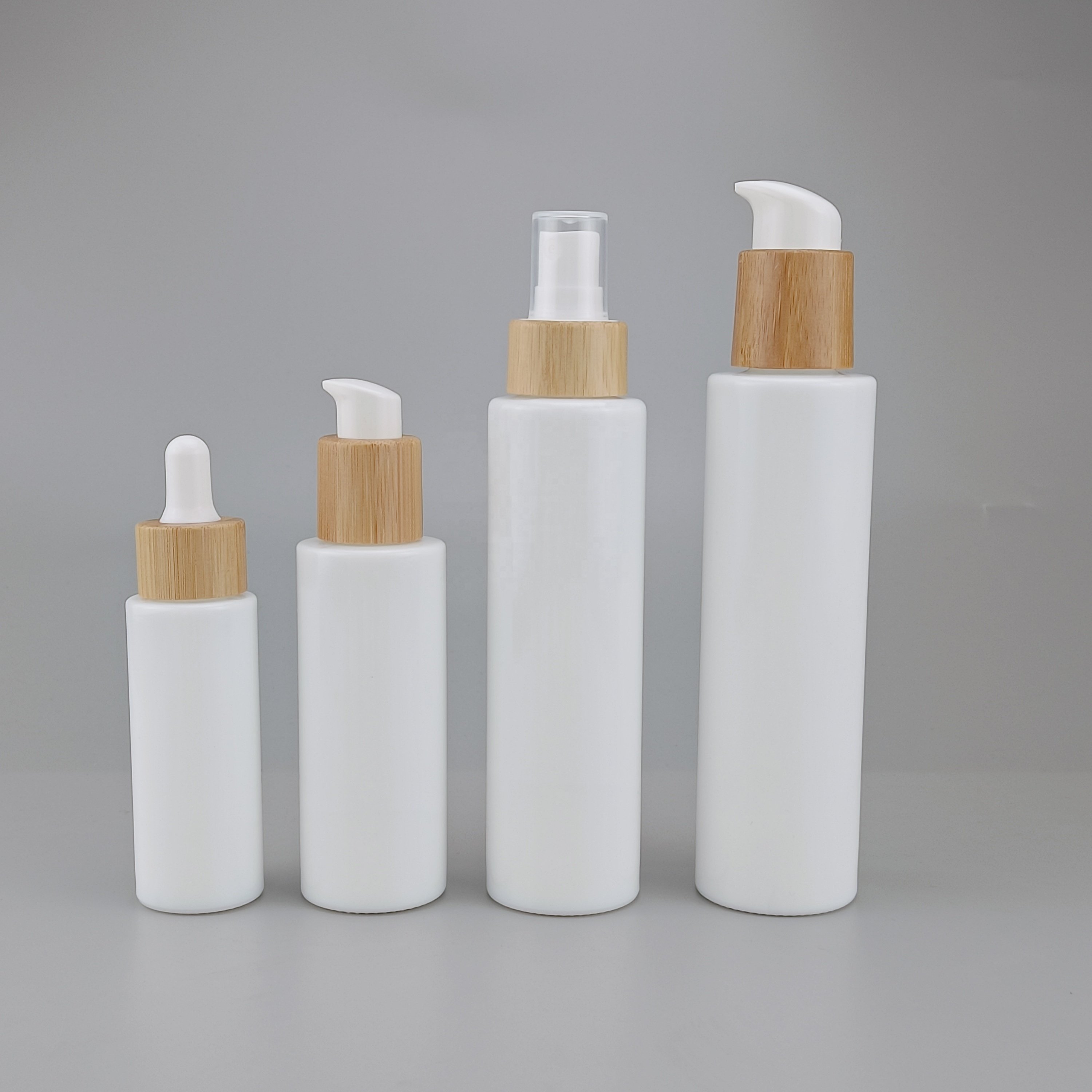 flat shoulder glass bottles 30ml 50ml 100ml 120ml opal glass cosmetic bottle with pump and 50g glass jar with bamboo lid