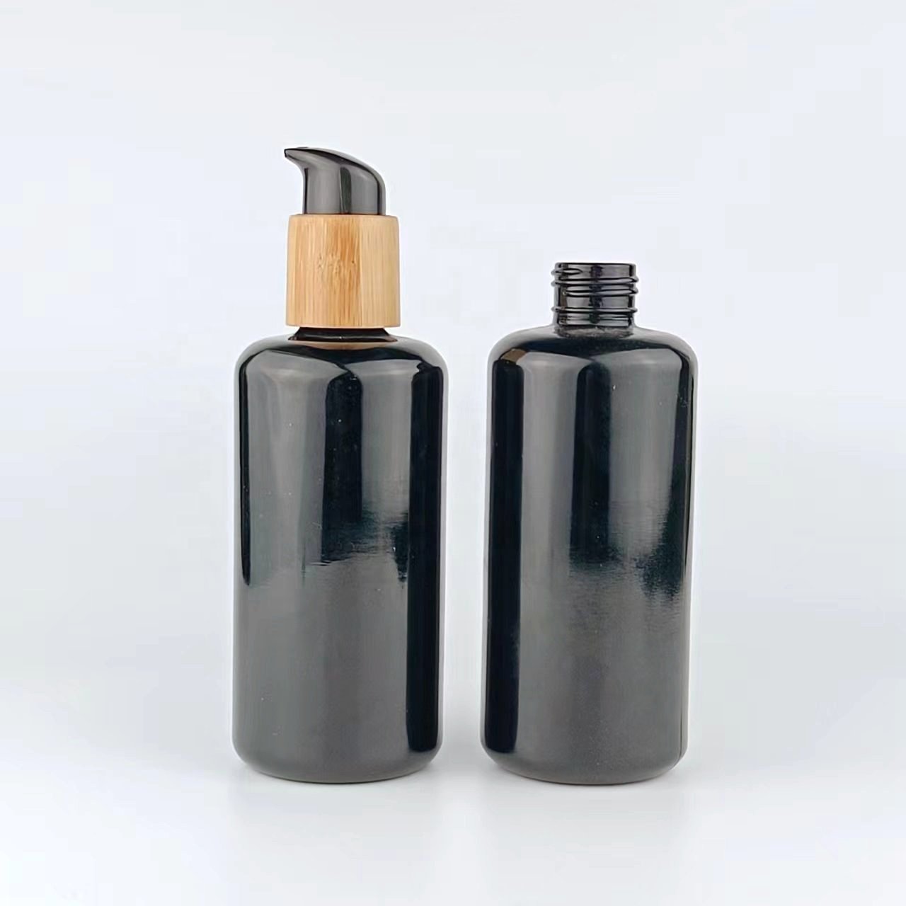200 ml black glass bottle serum pump bottle empty cosmetic bottle with bamboo pump 24/410 switch pump for cosmetic packaging