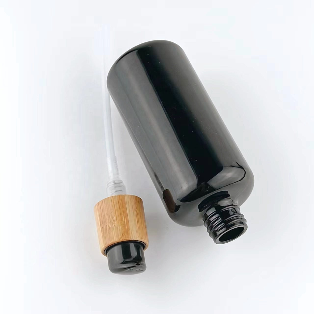 200 ml black glass bottle serum pump bottle empty cosmetic bottle with bamboo pump 24/410 switch pump for cosmetic packaging