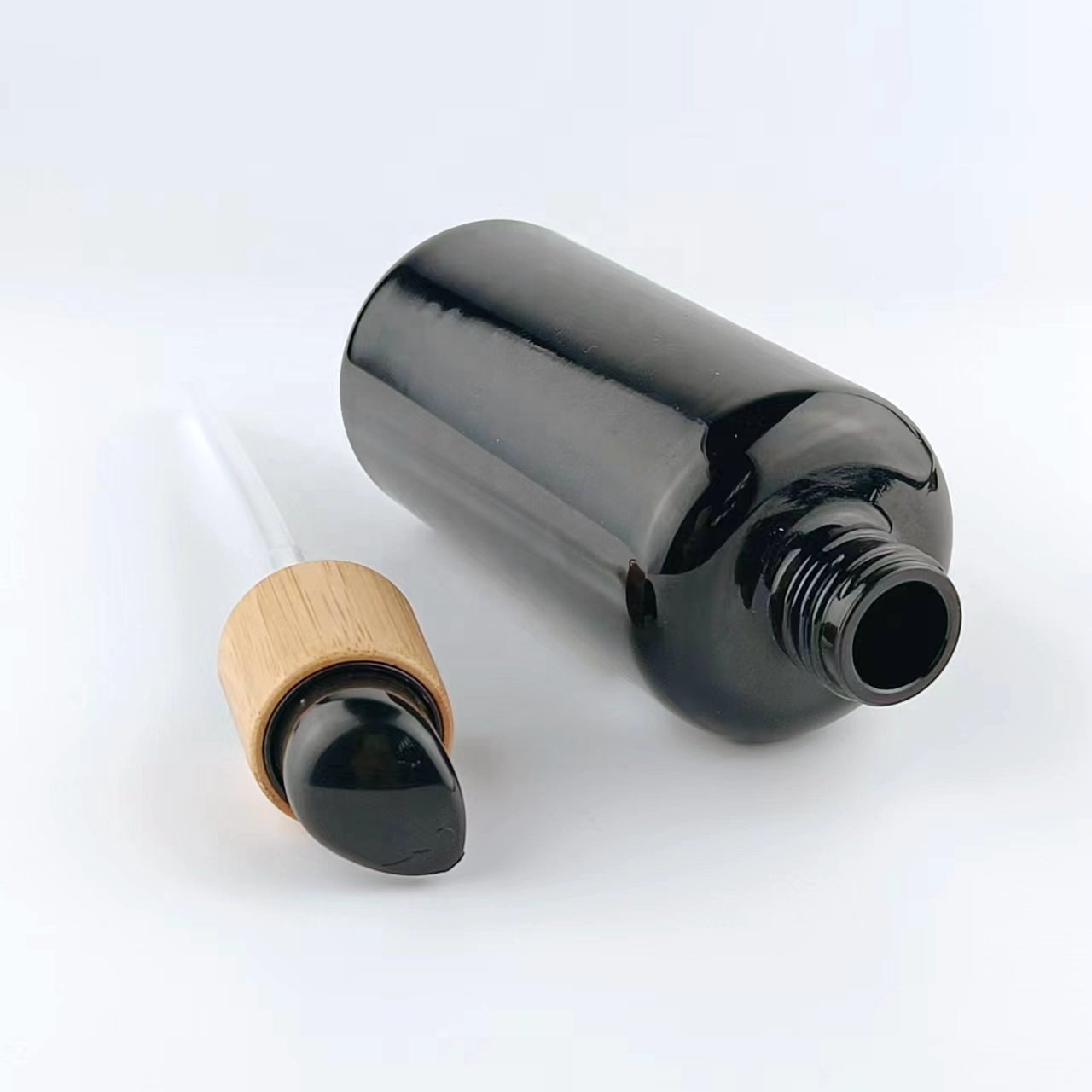 200 ml black glass bottle serum pump bottle empty cosmetic bottle with bamboo pump 24/410 switch pump for cosmetic packaging