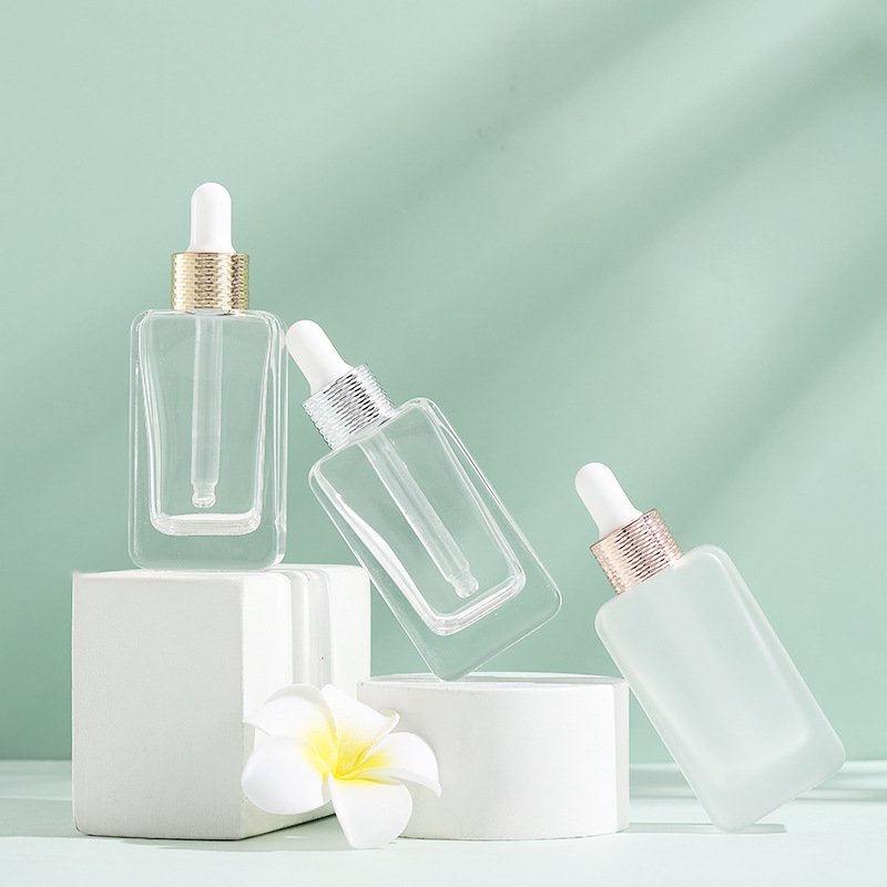 Cosmetic packaging Travel dispenser 30ml flat square glass dropper bottle for essential oil essence