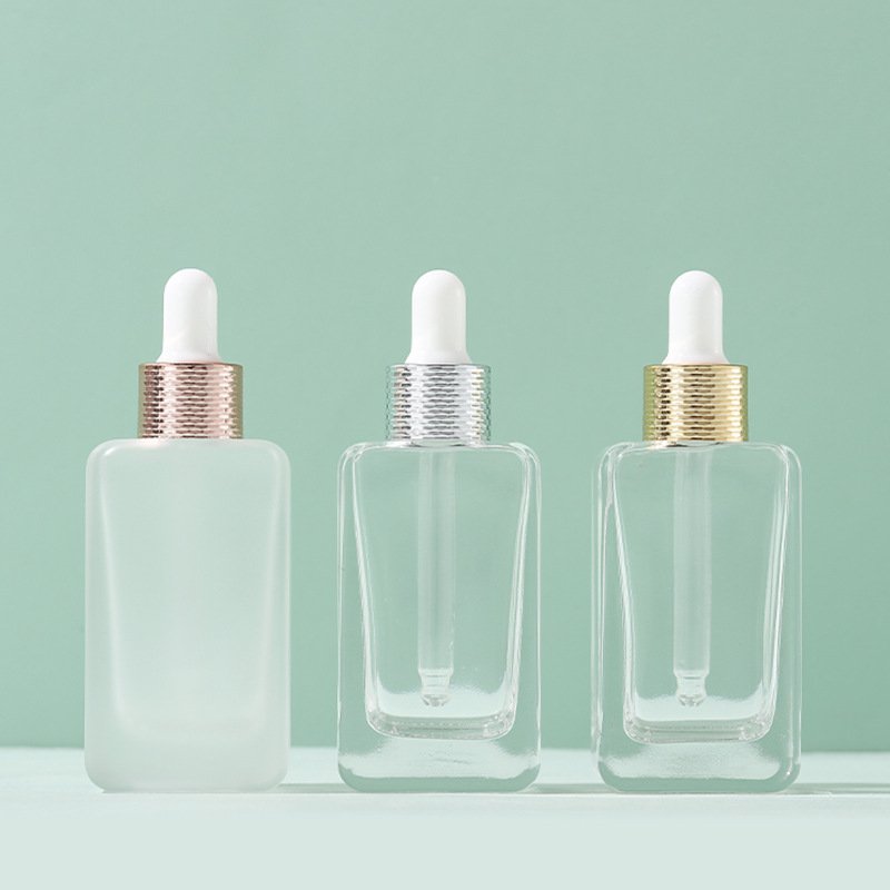 Cosmetic packaging Travel dispenser 30ml flat square glass dropper bottle for essential oil essence