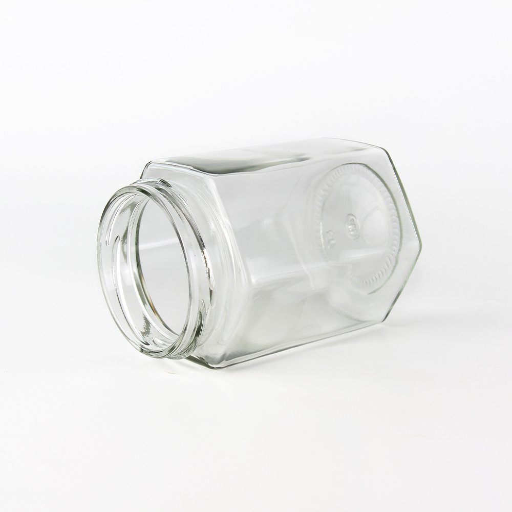 Hot selling glass jar honey jar food small jar packaging container hexagonal with metal screw lid