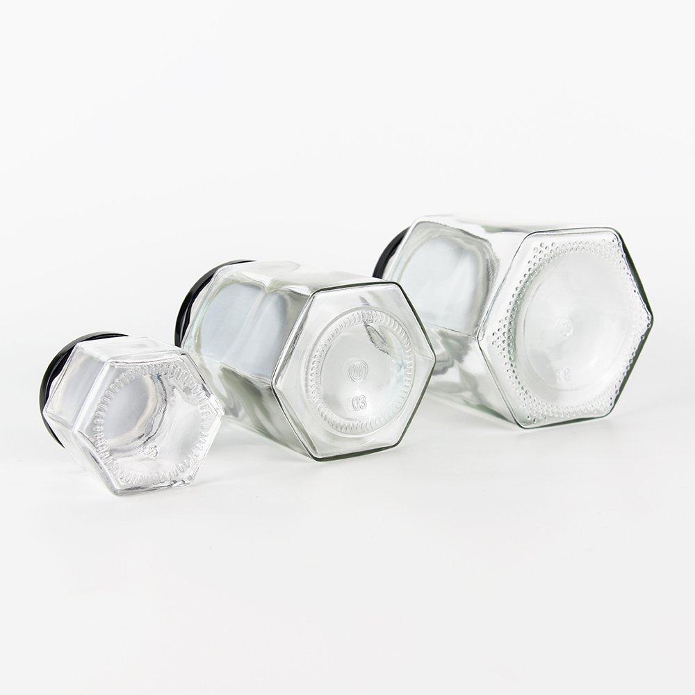 Hot selling glass jar honey jar food small jar packaging container hexagonal with metal screw lid