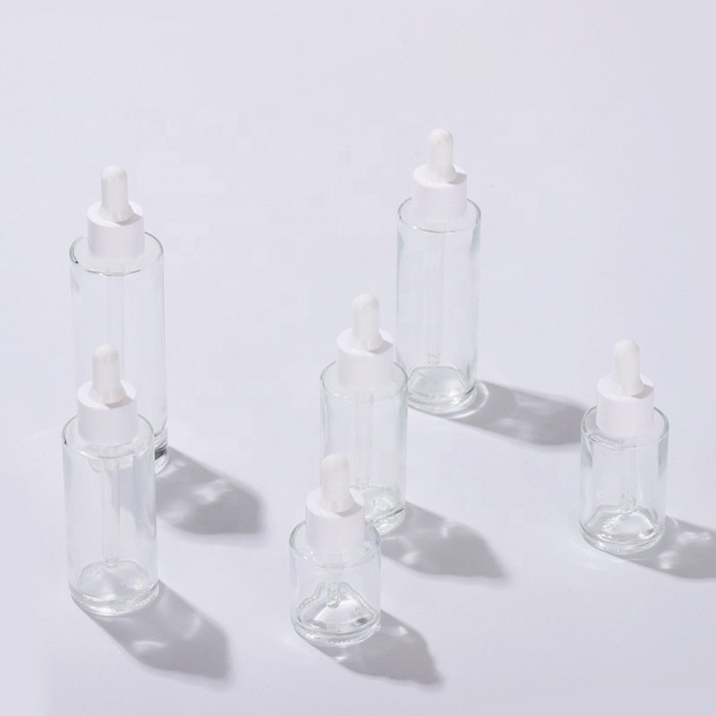 Wholesale Cosmetic 30ml Transparent Matte Flat Shoulder Eye Serum Dropper Glass Bottle Set with White Dropper Lid