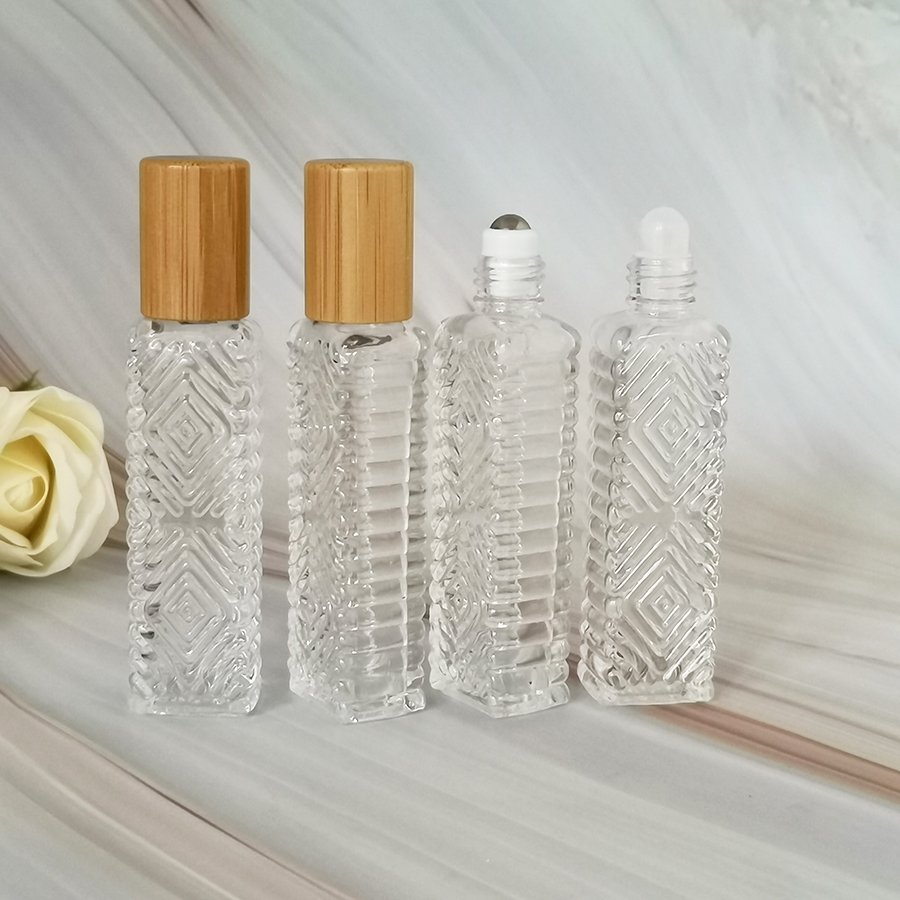 Pattern Design 14ml long square clear glass roll on bottle with bamboo cap and roller for essential oils