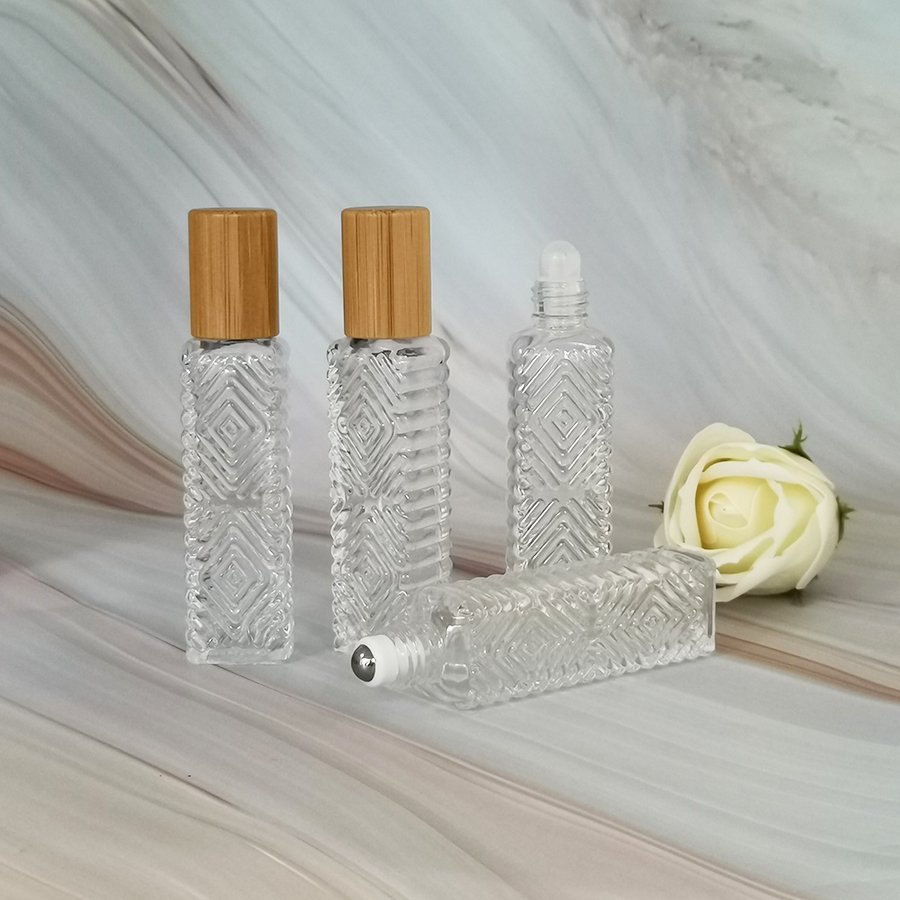 Pattern Design 14ml long square clear glass roll on bottle with bamboo cap and roller for essential oils