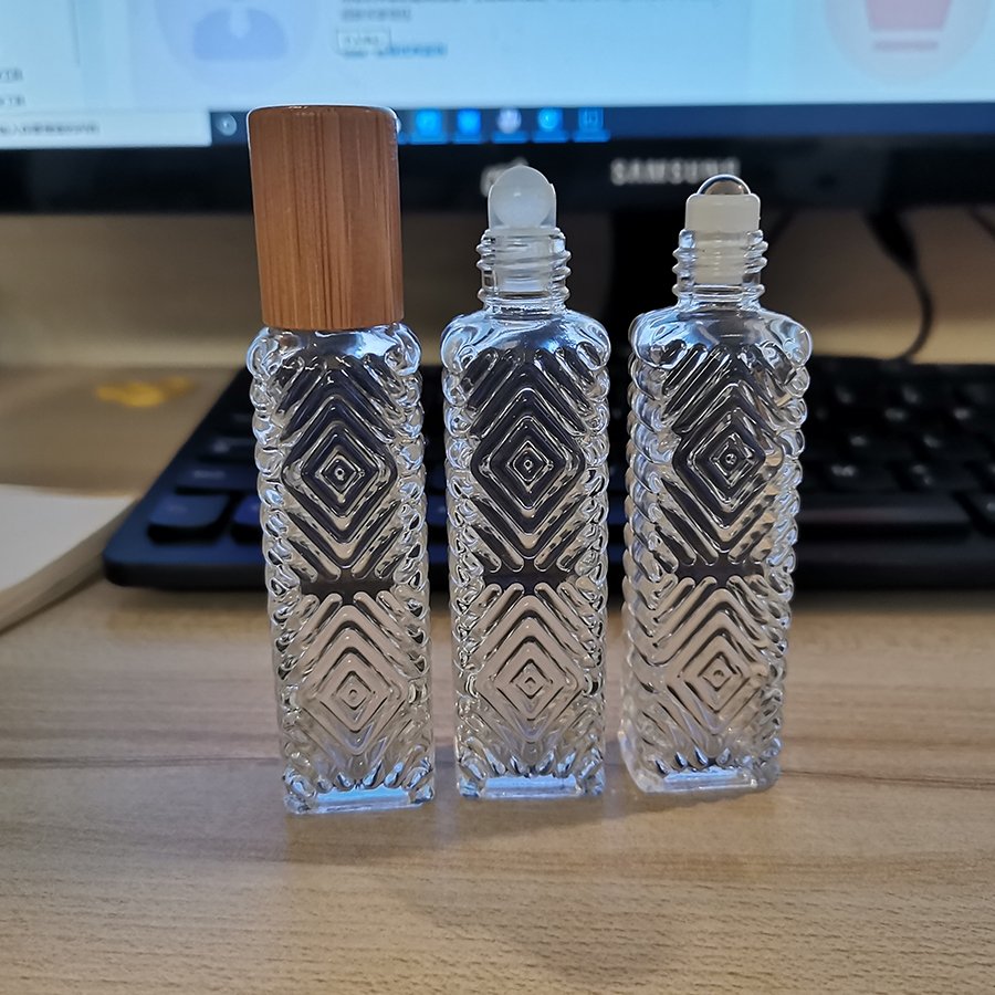 Pattern Design 14ml long square clear glass roll on bottle with bamboo cap and roller for essential oils