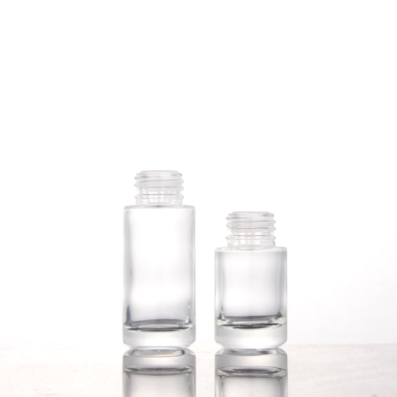 Fancy round cylinder empty glass bottles 20ml 30ml cosmetic serum essential oil dropper bottle with new design lid