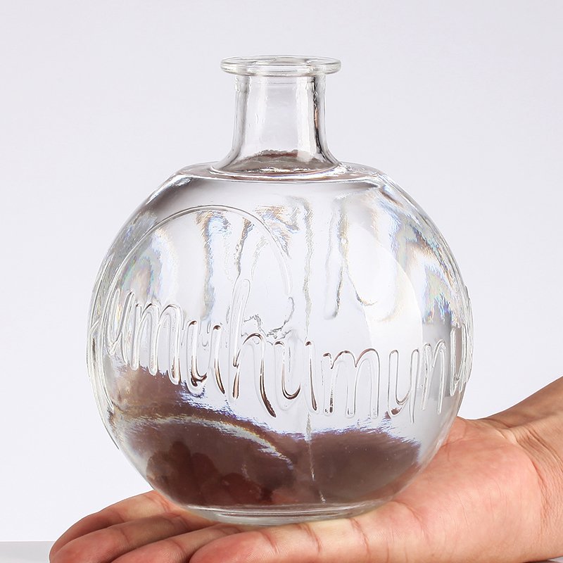 Wholesale Stocked 200Ml Ball Shaped Empty Wine Liquor Glass Bottle With Lid Sealed